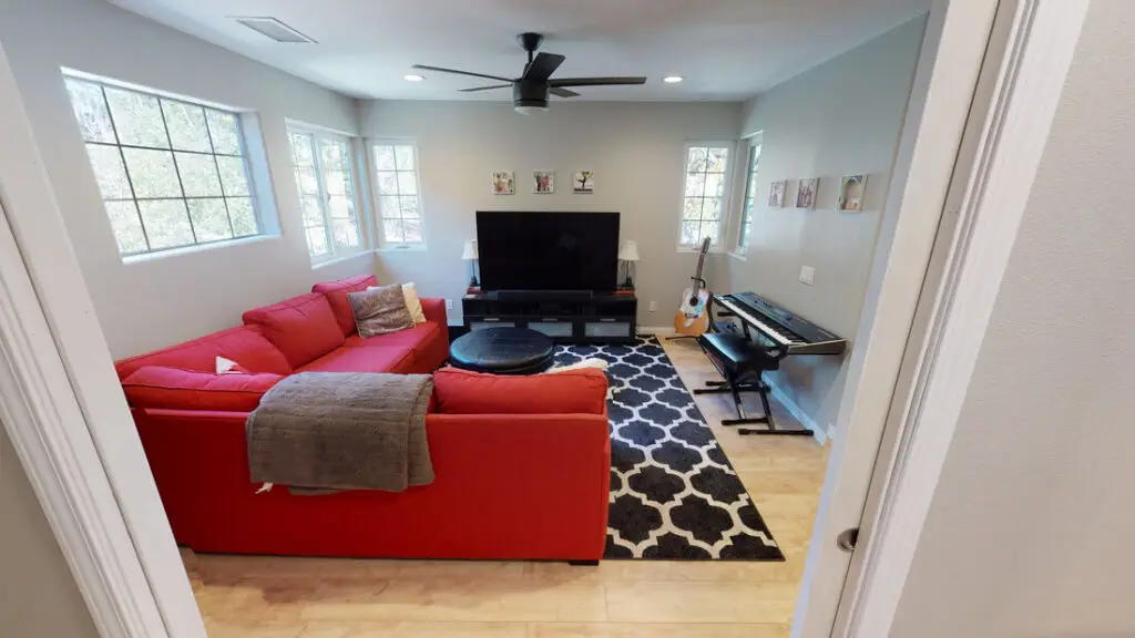 Home remodeling contractor completing a room addition in Orange County, creating a functional and comfortable residential living space.